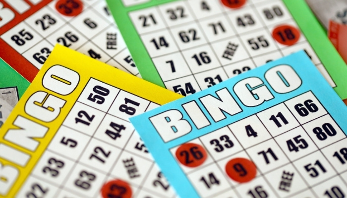 Colorful bingo cards with red markers at The Hill Bar & Grill in Glyndon MN restaurant and bar.